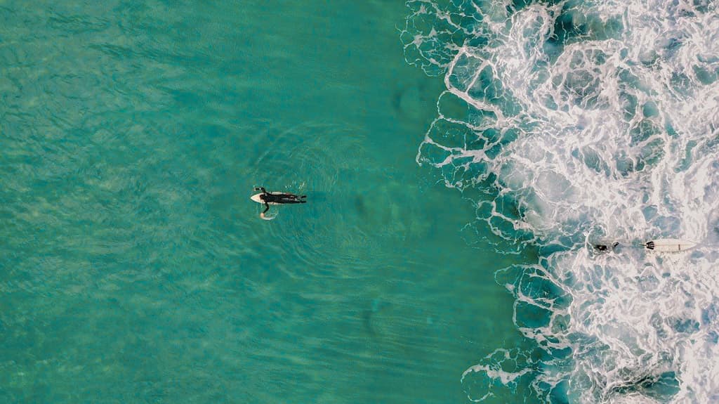 Surfers enjoying the waves at Weligama Beach on Sri Lanka’s southern coast.